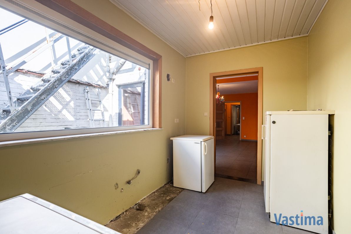 Solide rijwoning met garage en tuin in het hart van Aalst foto 8