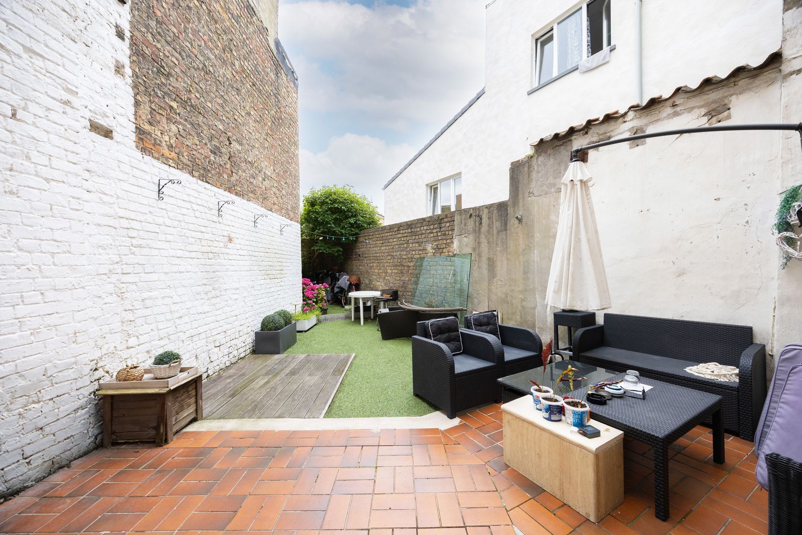 Charmante rijwoning met zonnige binnentuin foto 2