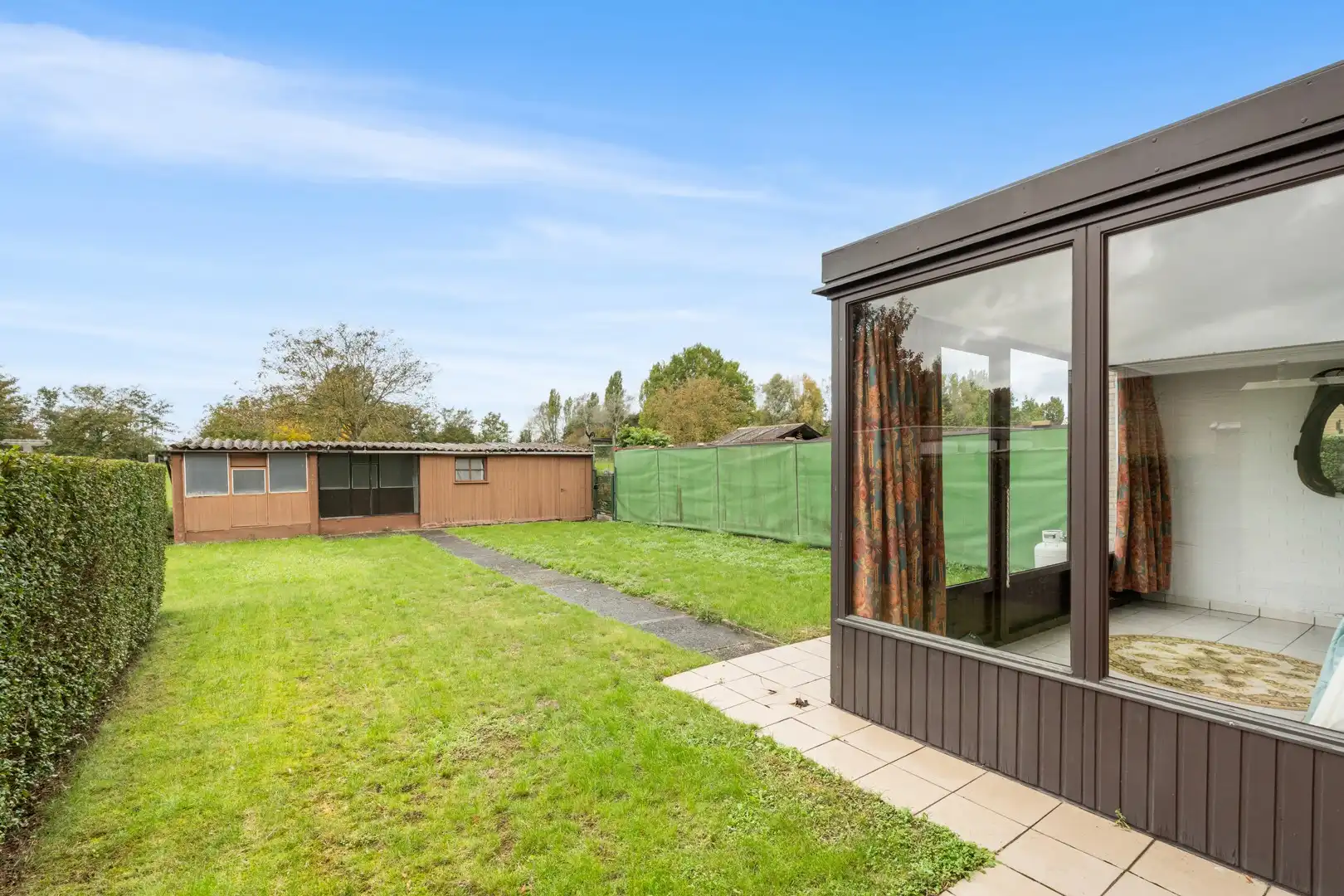 Zeer ruime kloeke woning met grote tuin! foto 24