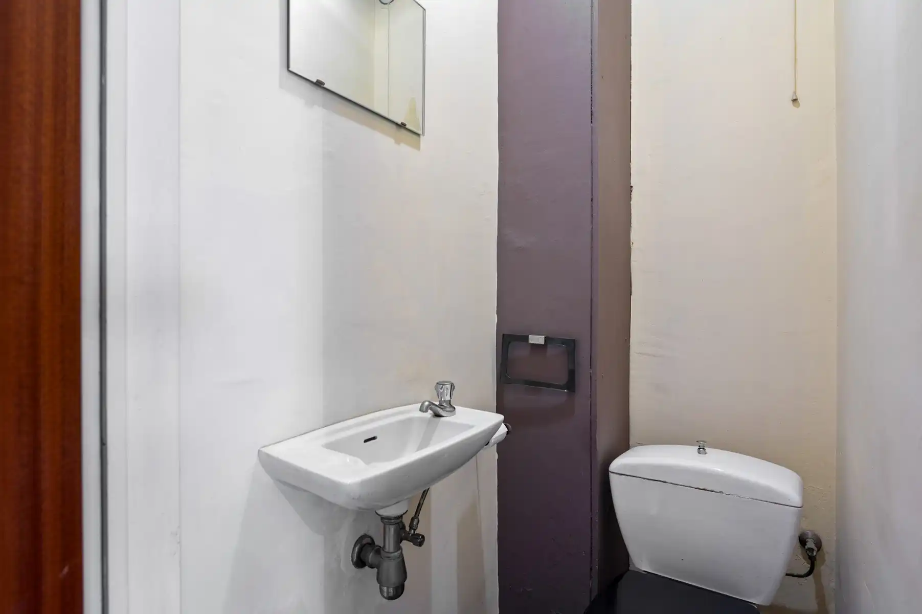 Te renoveren appartement met garage op uitstekende ligging foto 17