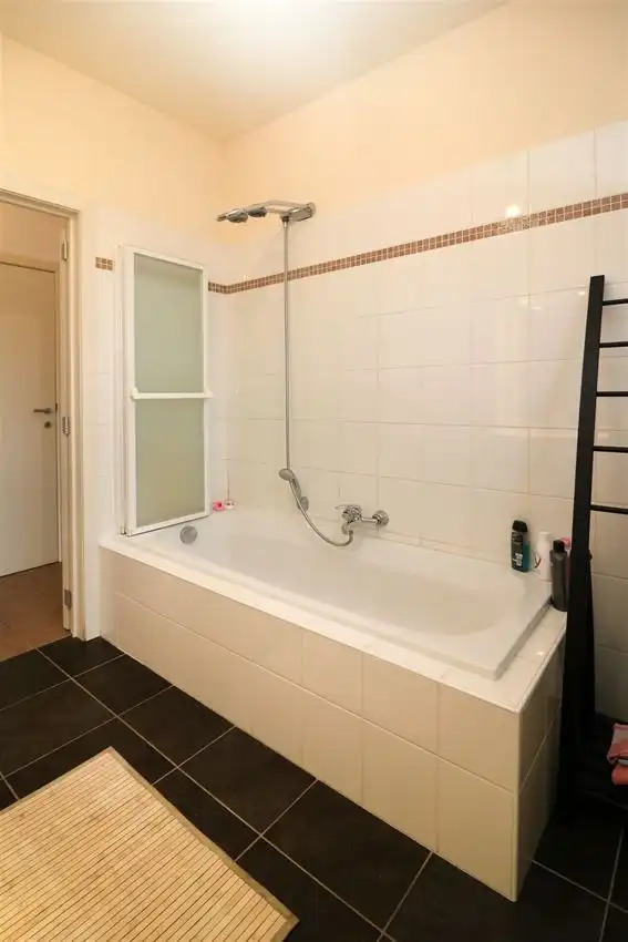 Ruim gelijkvloers wonen met tuin én rendement. foto 18