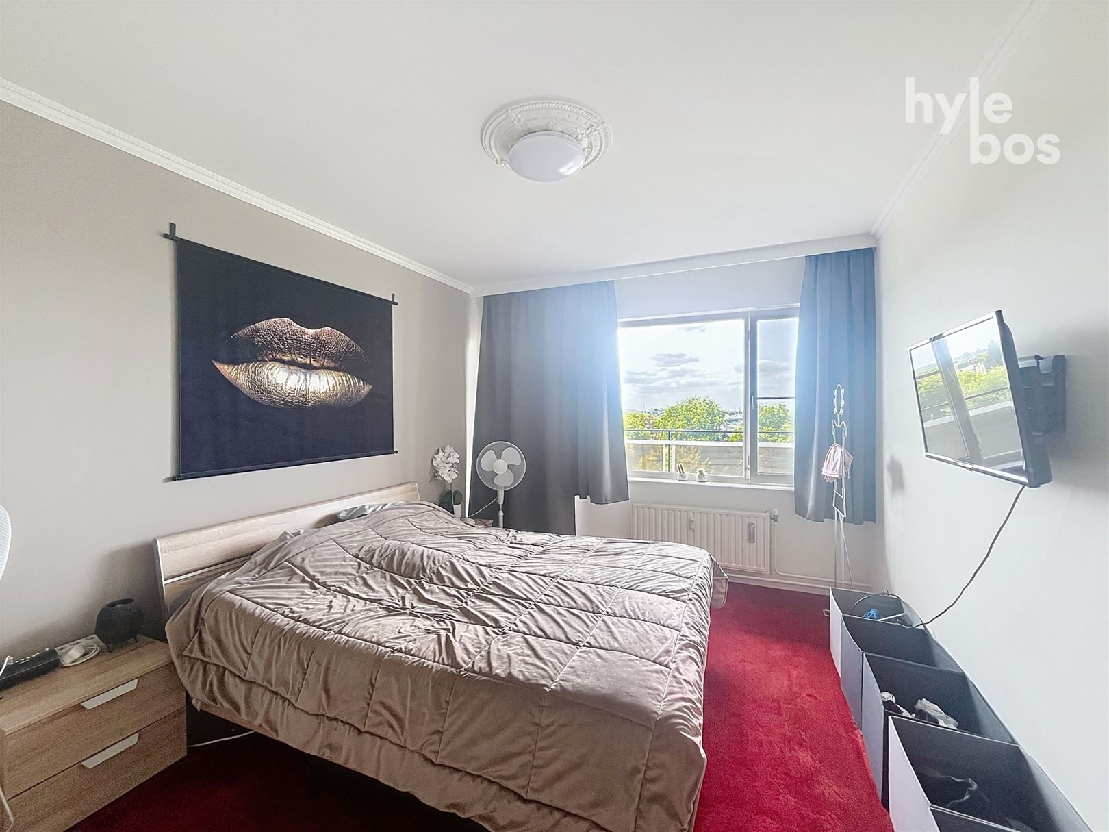 Ruim instapklaar 2 slaapkamer appartement met garage foto 9