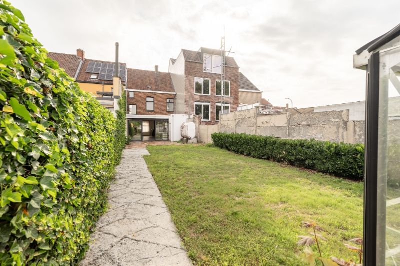 Ruime en veelzijdige rijwoning met garage achteraan en aparte ingang foto 21