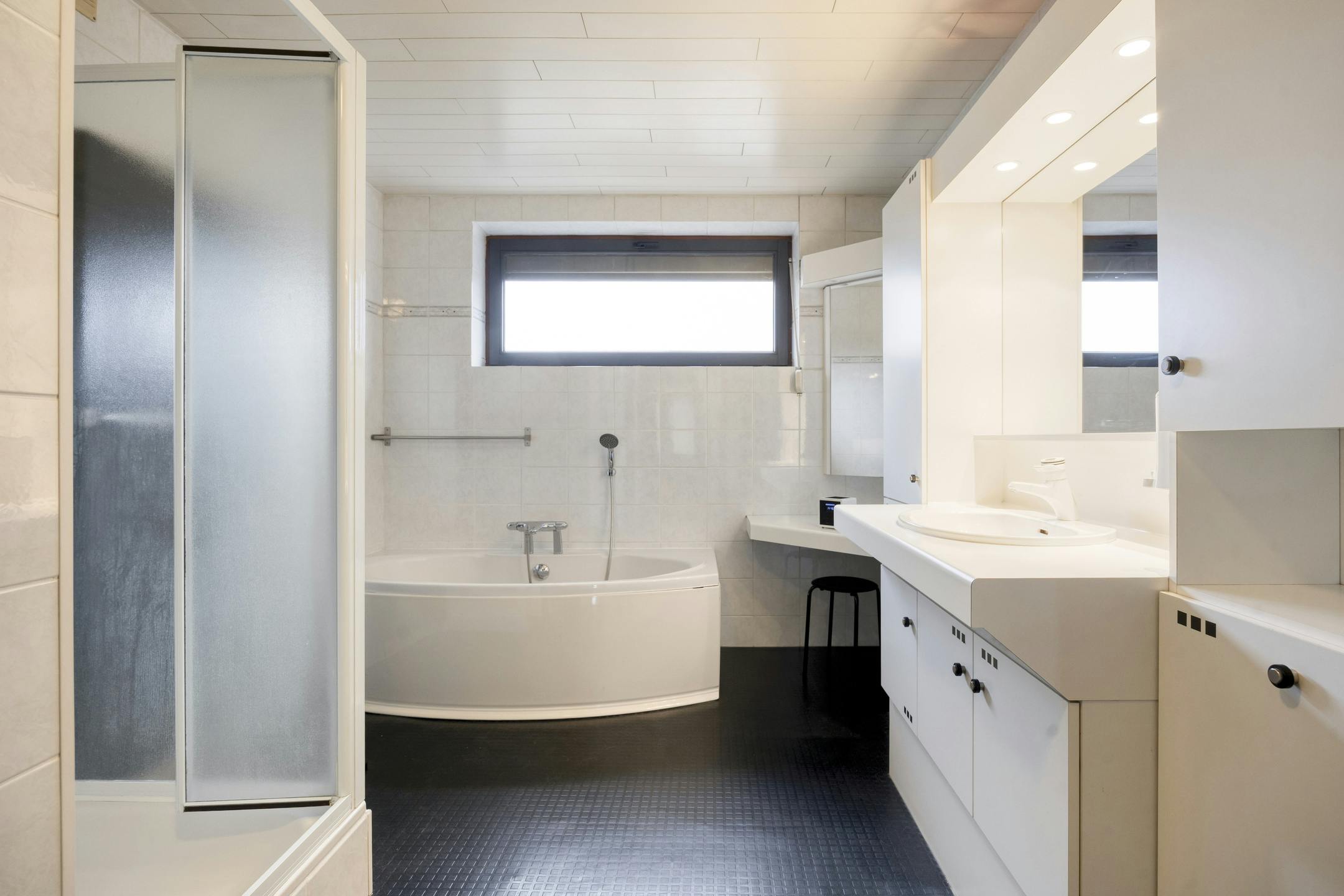 Goed gelegen stadswoning met 3 of 4 slaapkamers, tuin en garagebox  foto 20