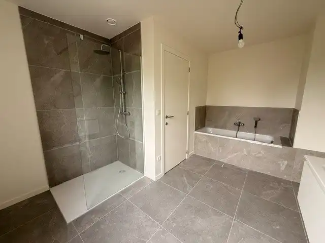 Halfopen nieuwbouwwoning met 4 slaapkamers gelegen te Opitter. foto 23