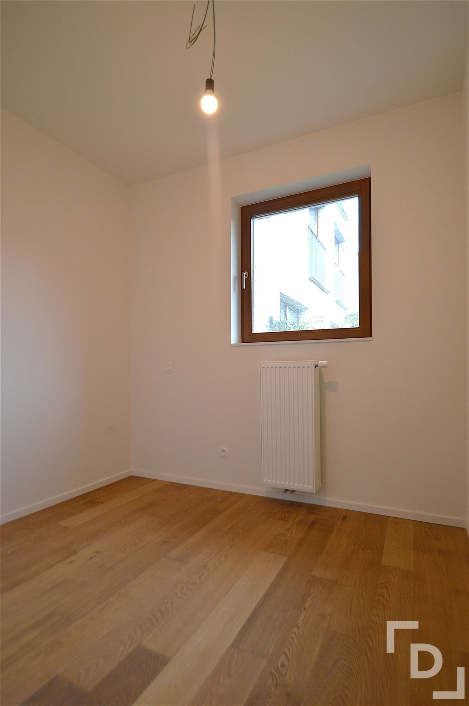 Gelijkvloers appartement met tuintje. foto 10