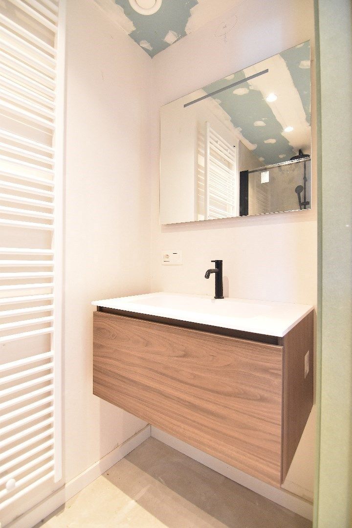 Nieuwbouwappartement gelijkvloers - één slaapkamer foto 14