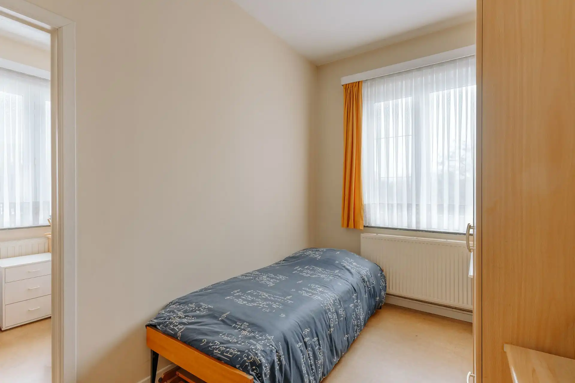 Ruim 3-slaapkamerappartement met karakter en autostaanplaats foto 14