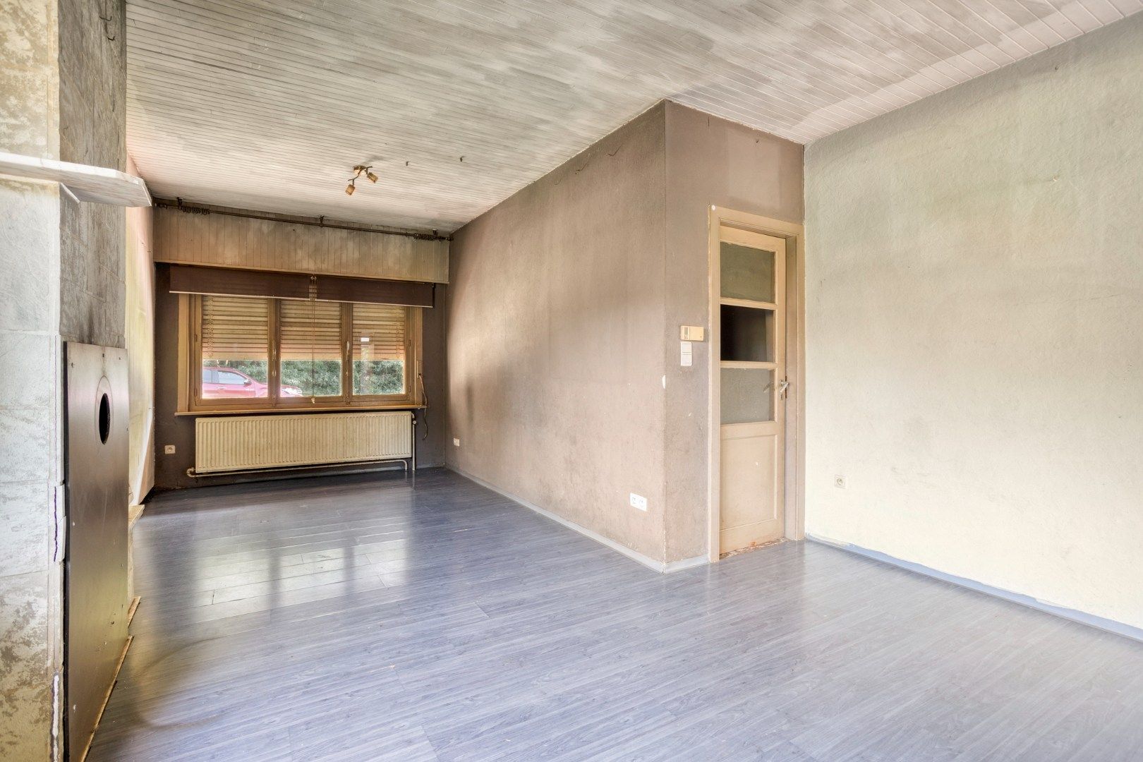 Te renoveren woning, rustig en landelijk gelegen op 1.265 m² nabij het centrum ! foto 3