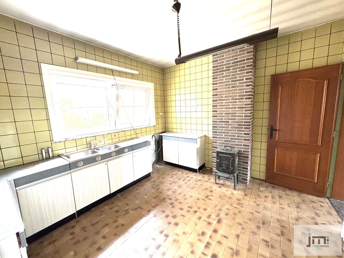 Twee woningen met potentieel in het landelijke Voort foto 7