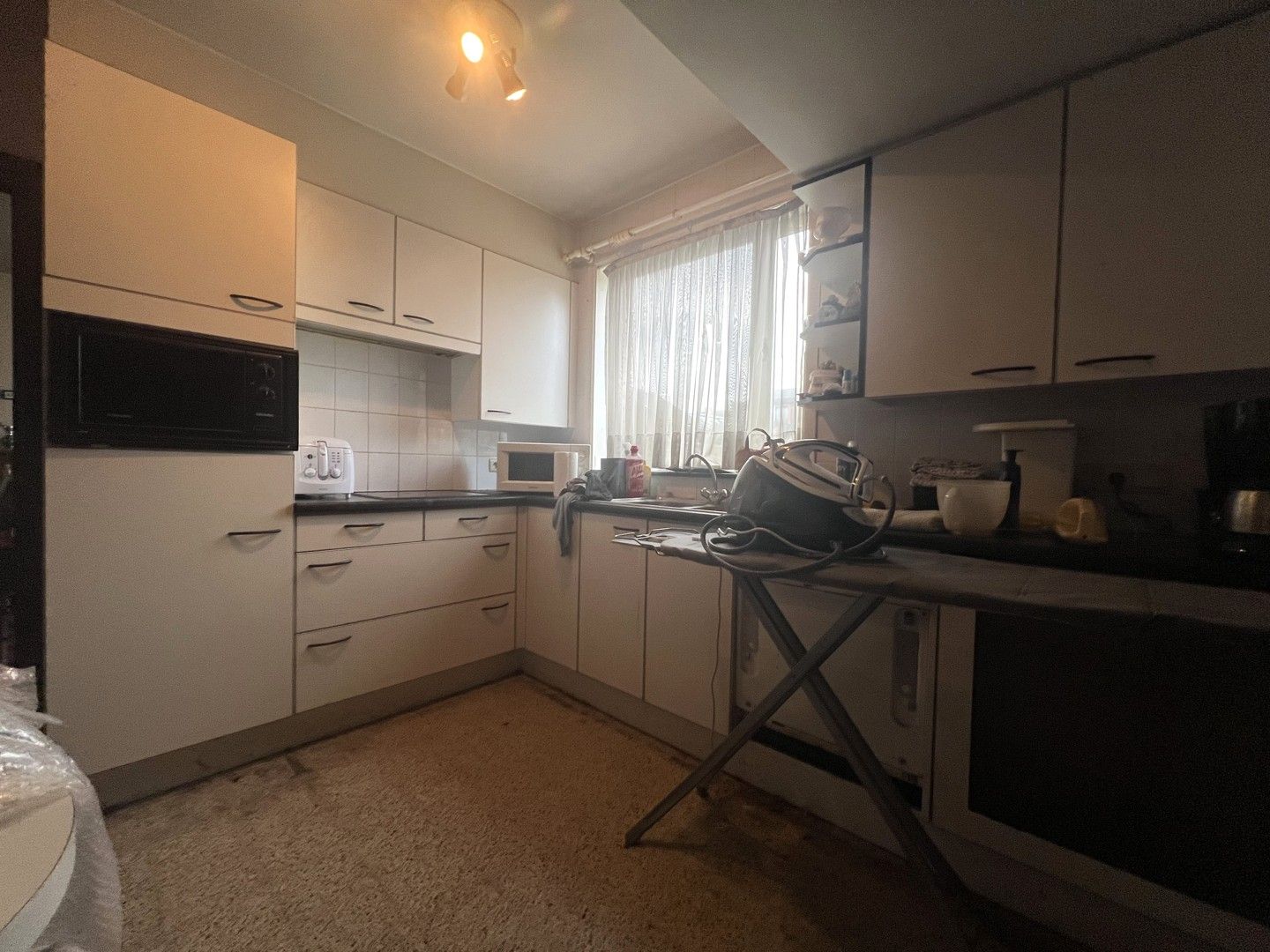 Halfopen woning met zonnige tuin foto 9