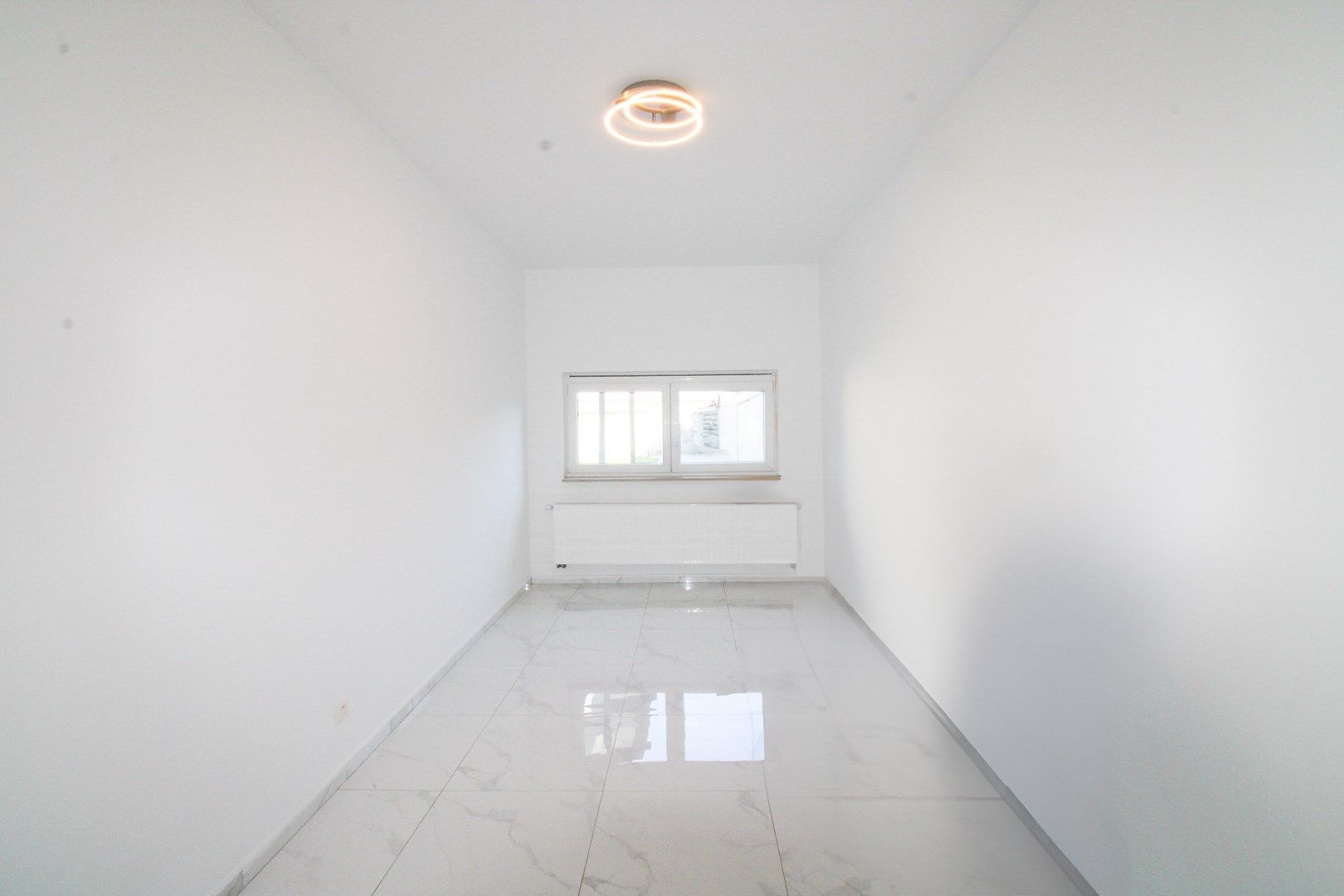 Instapklaar wonen in Schoten: moderne woning met 3 slaapkamers, tuin en inpandige garage te koop! foto 4