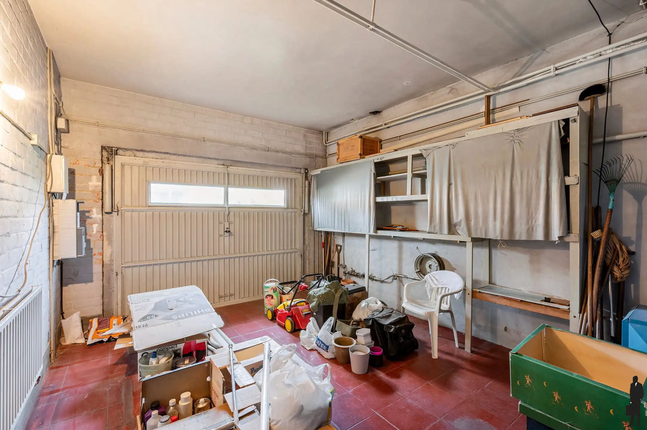 Te renoveren woning met garage én tuin foto 8