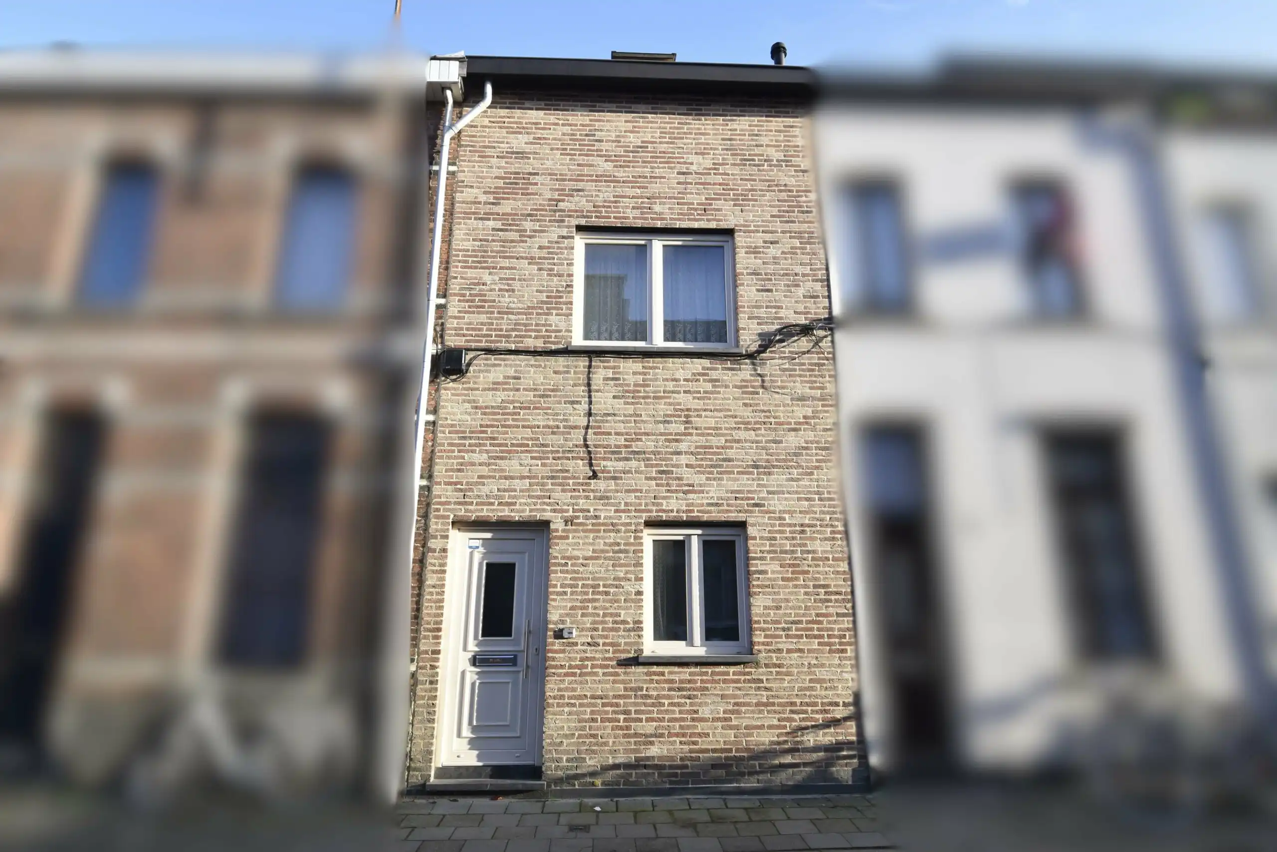 Zeer recente, energiezuinige stadswoning in het hart van Sint-Niklaas foto {{pictureIndex}}
