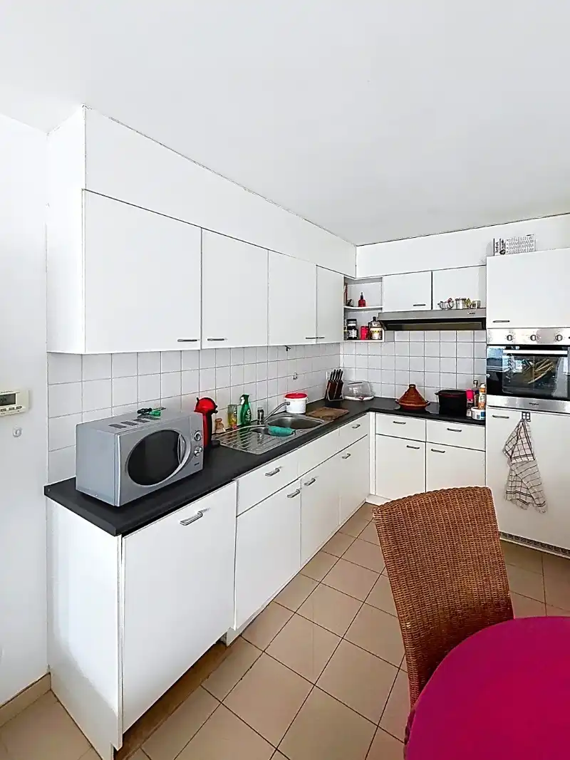 Gelijkvloers appartement met 2 slaapkamers en tuin foto 4