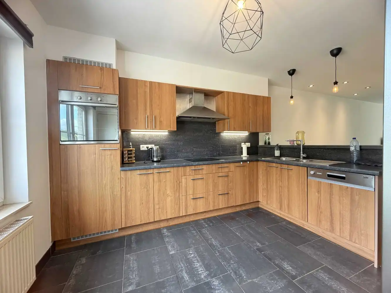 Duplexappartement met terras en ondergrondse staanplaats foto 4
