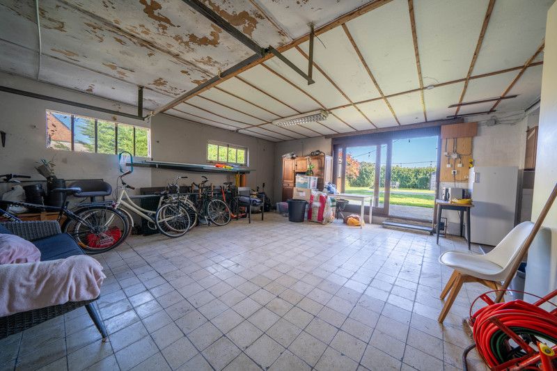 Rustig gelegen woning op 8are met aanpalende garage en zwembad foto 24