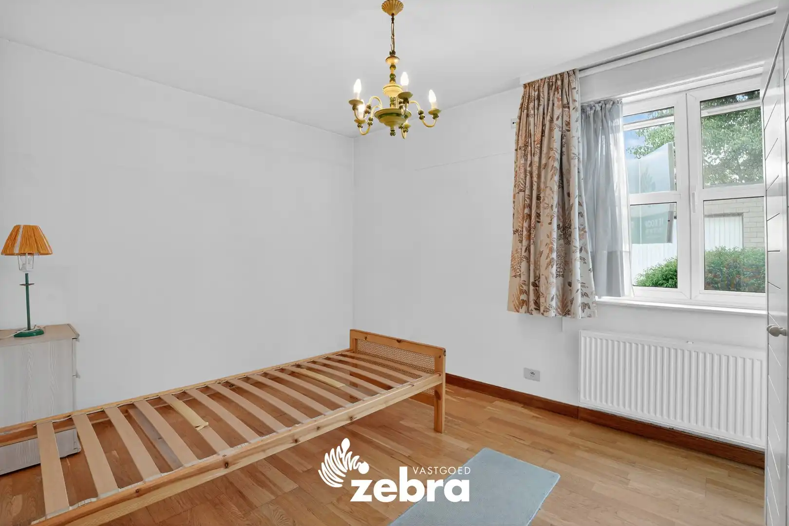 Gelijkvloers appartement met zuidoost gerichte tuin te Roeselare! foto 14