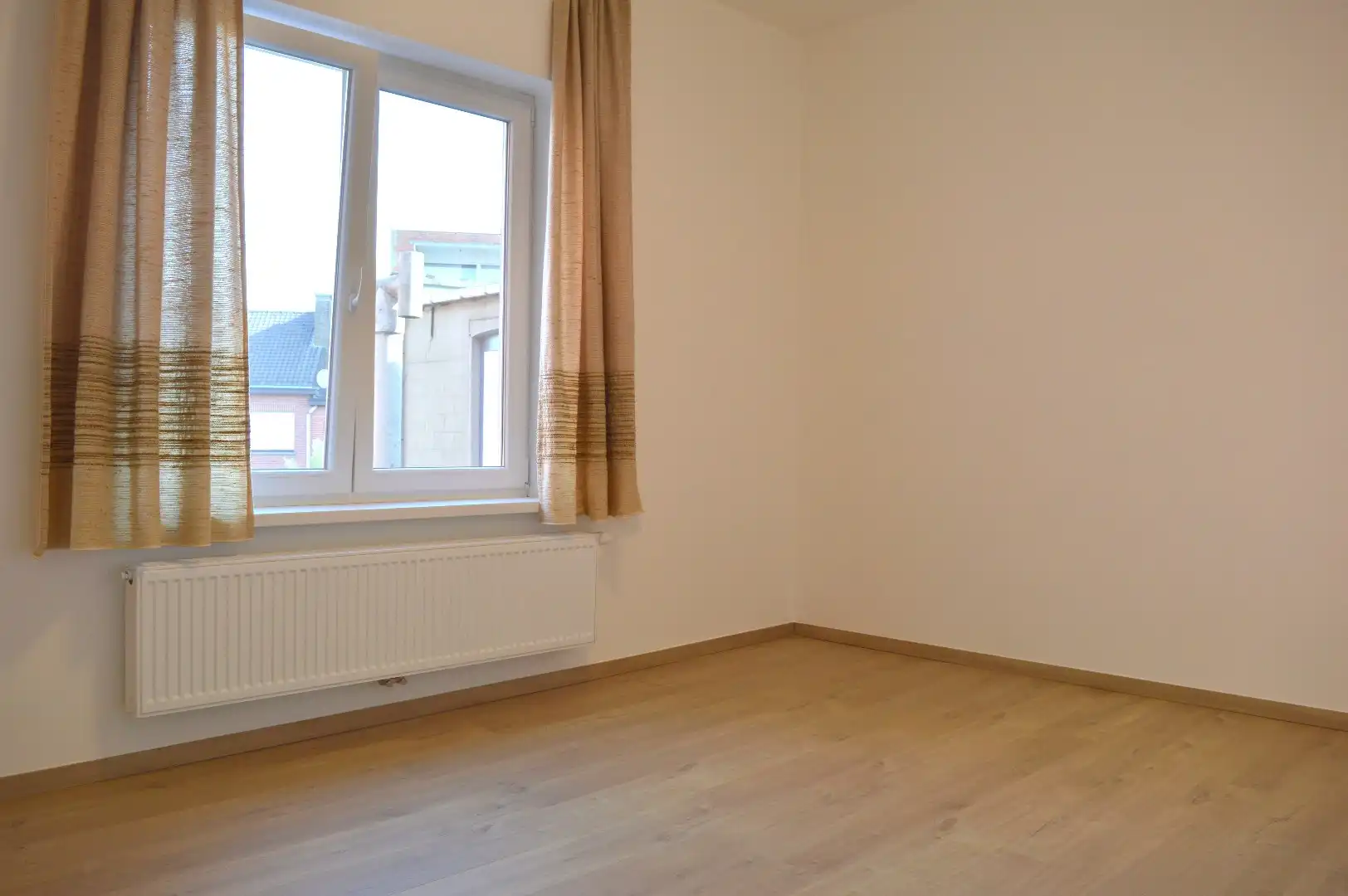 Gezellige woning met 2 slaapkamers en mooi stukje tuin te koop te Heule foto 10