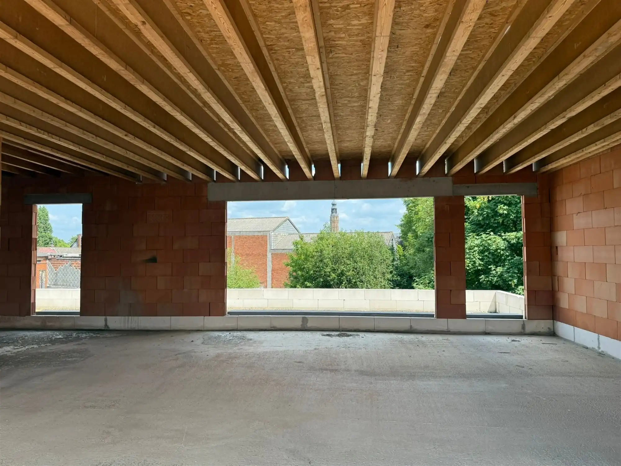 Ruwbouw appartementsgebouw in centrum van Herentals foto {{pictureIndex}}