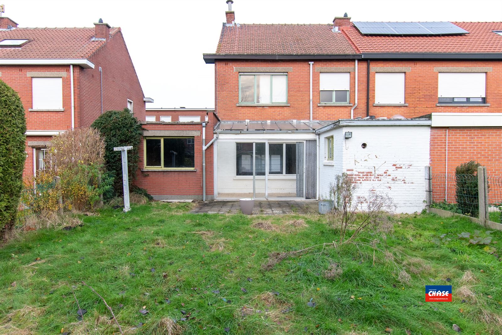 Te renoveren half-open bebouwing met 2 tot 4 slaapkamers, garage en tuin  foto 8