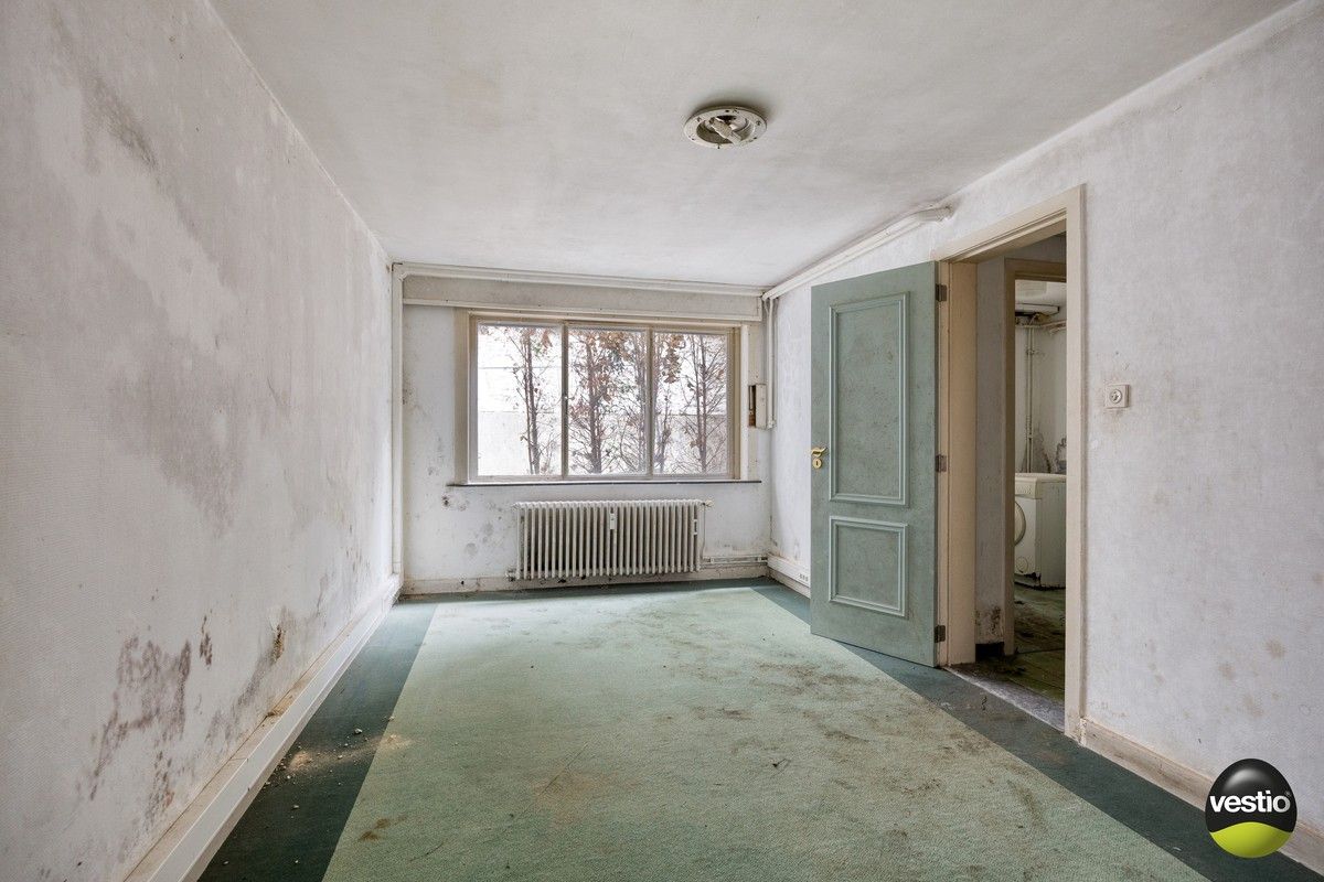 Gelijkvloers appartement met souterrain aan het Leopoldplein – renovatieproject op toplocatie in Hasselt. foto 8