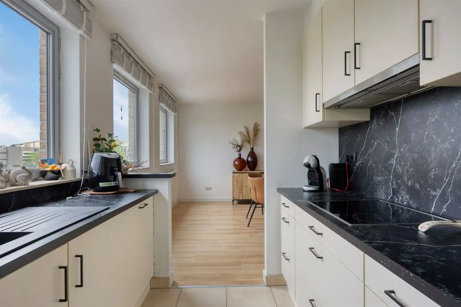 TE KOOP: Instapklaar duplexappartement met 3 slaapkamers en prachtig terras in hartje Zolder! foto 12