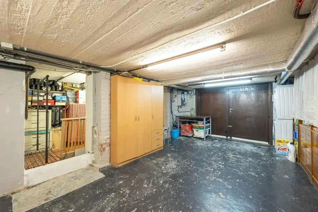 Gezellige woning met ruime garage en stadskoer foto 10