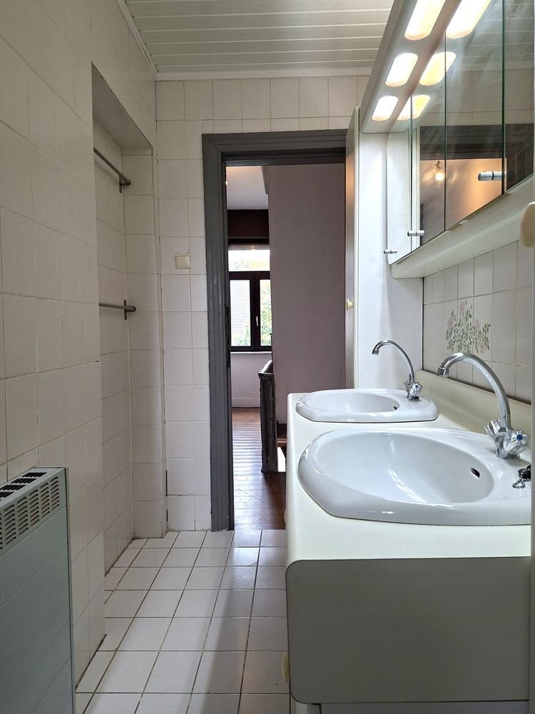 Licht te renoveren woning / 4 slaapkamers en tuin / centrale ligging foto 28