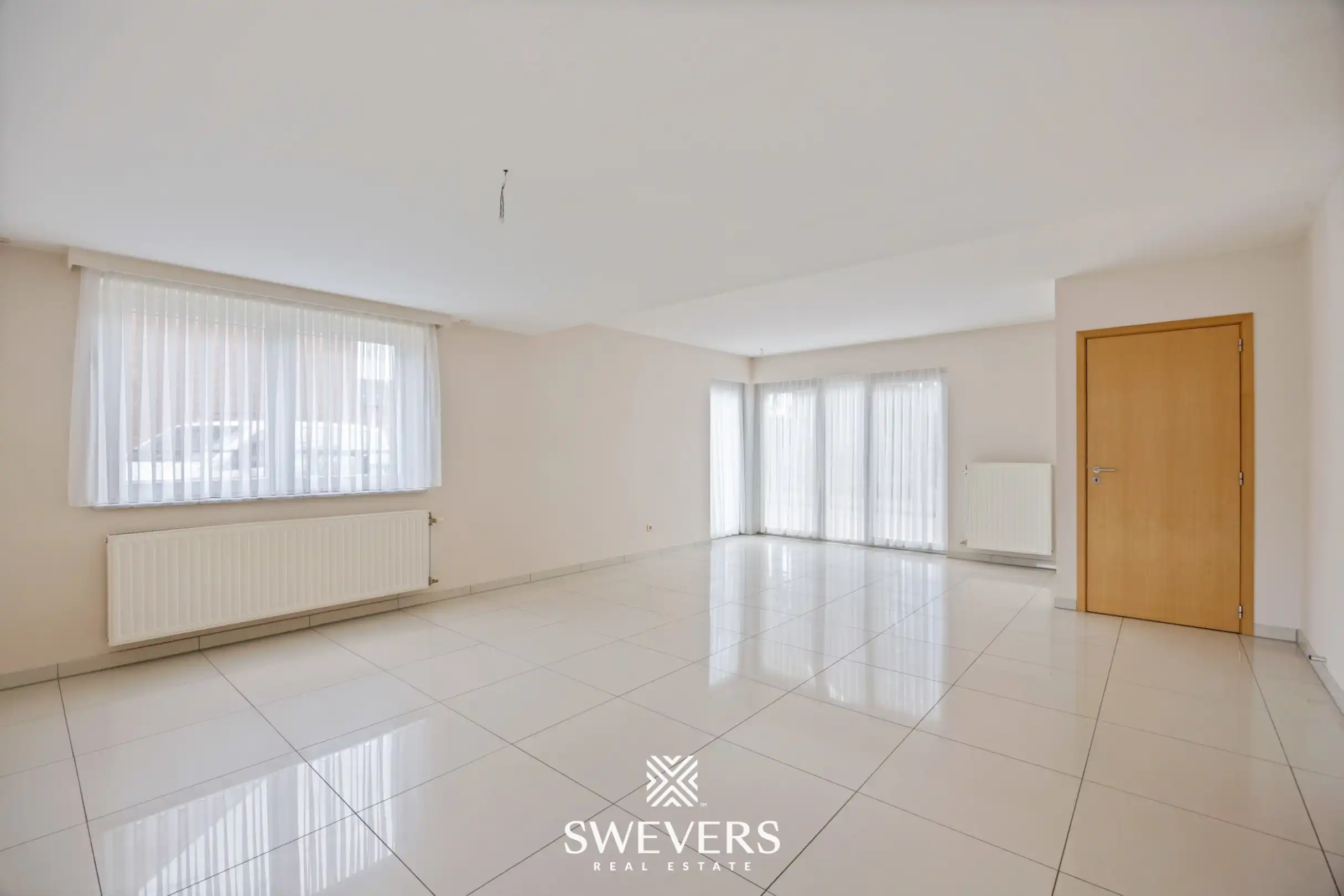 Uitstekend gelegen gelijkvloers appartement met 2 slaapkamers en private tuin foto 2