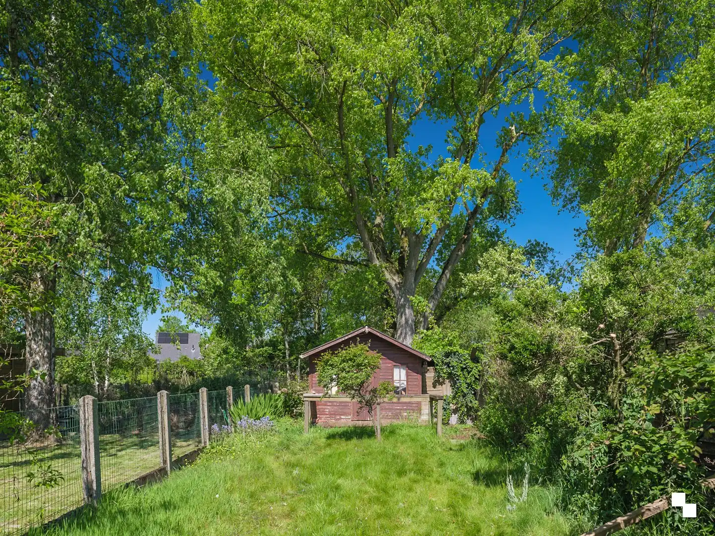 Te renoveren woning met gezellige tuin in het hart van Merelbeke foto 24