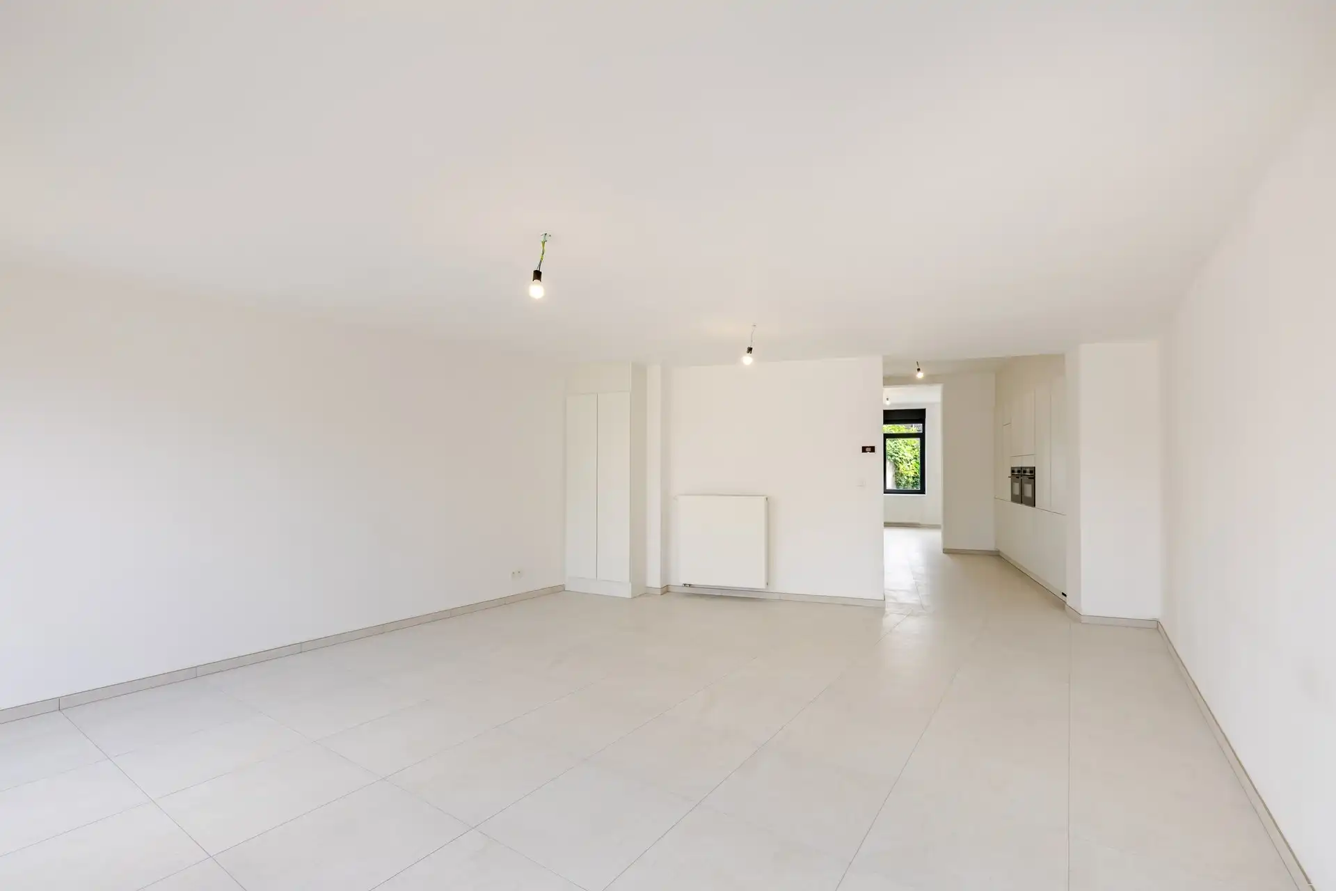 Instapklare, volledig gerenoveerde gezinswoning met 4 slaapkamers, garage en zonnige stadstuin foto 10