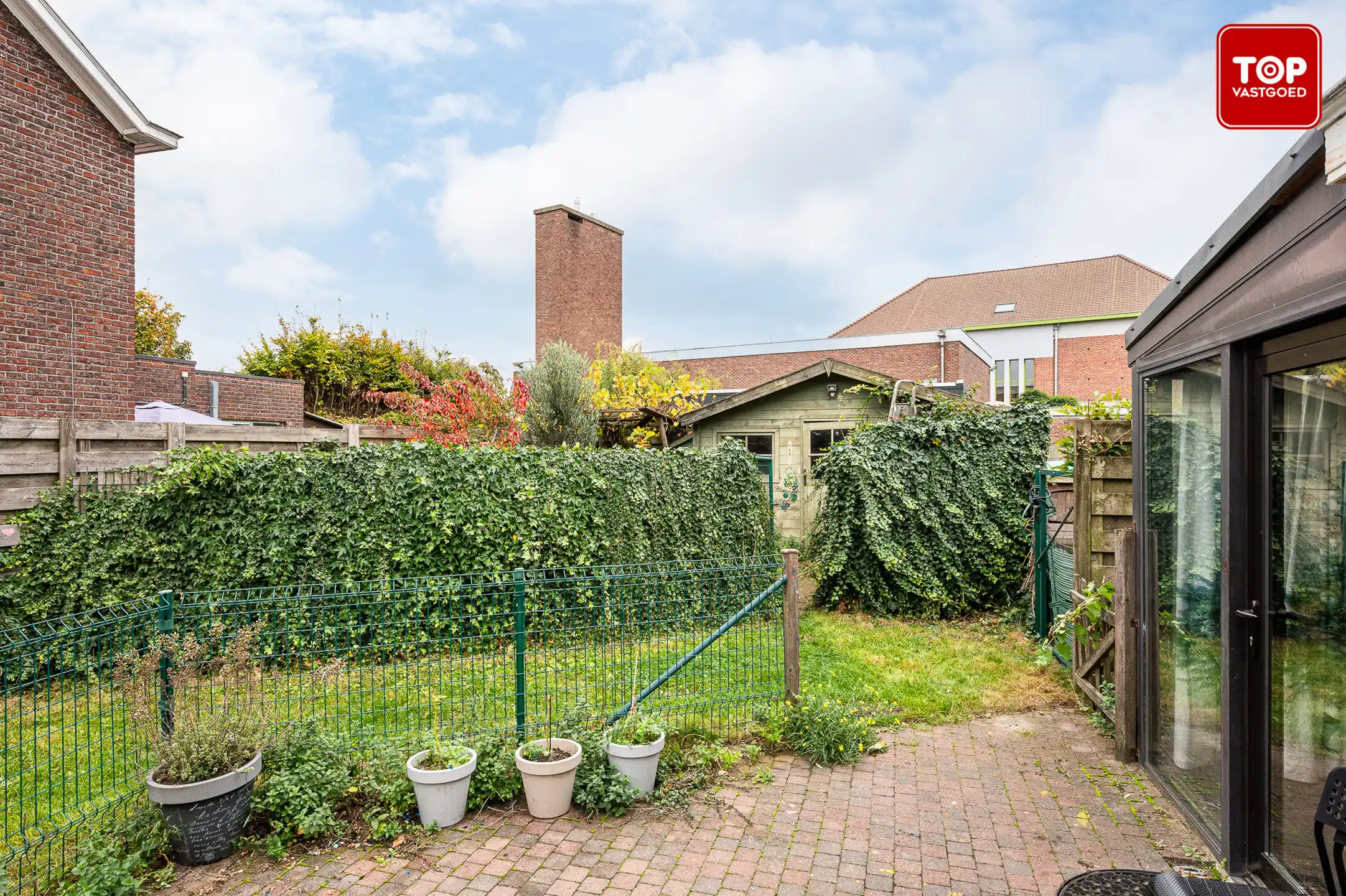 Instapklare woning met 4 slaapkamers en tuin in het hart van Sleidinge foto 13