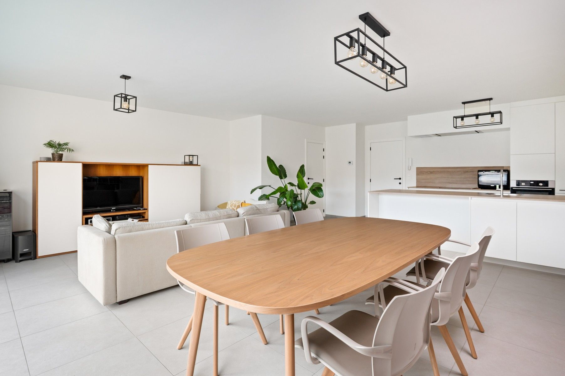 Instapklaar en energiezuinig gelijkvloers appartement met terras en tuin foto 11