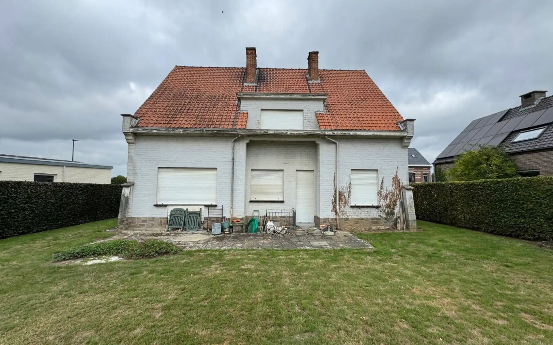 Te renoveren woning in centrum van Sint-Pieters-Leeuw foto 2