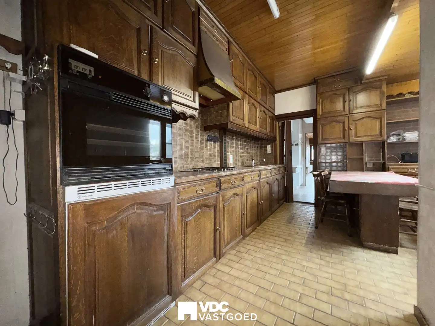 Te renoveren woning met werkplaats, garage en veel potentieel foto 9