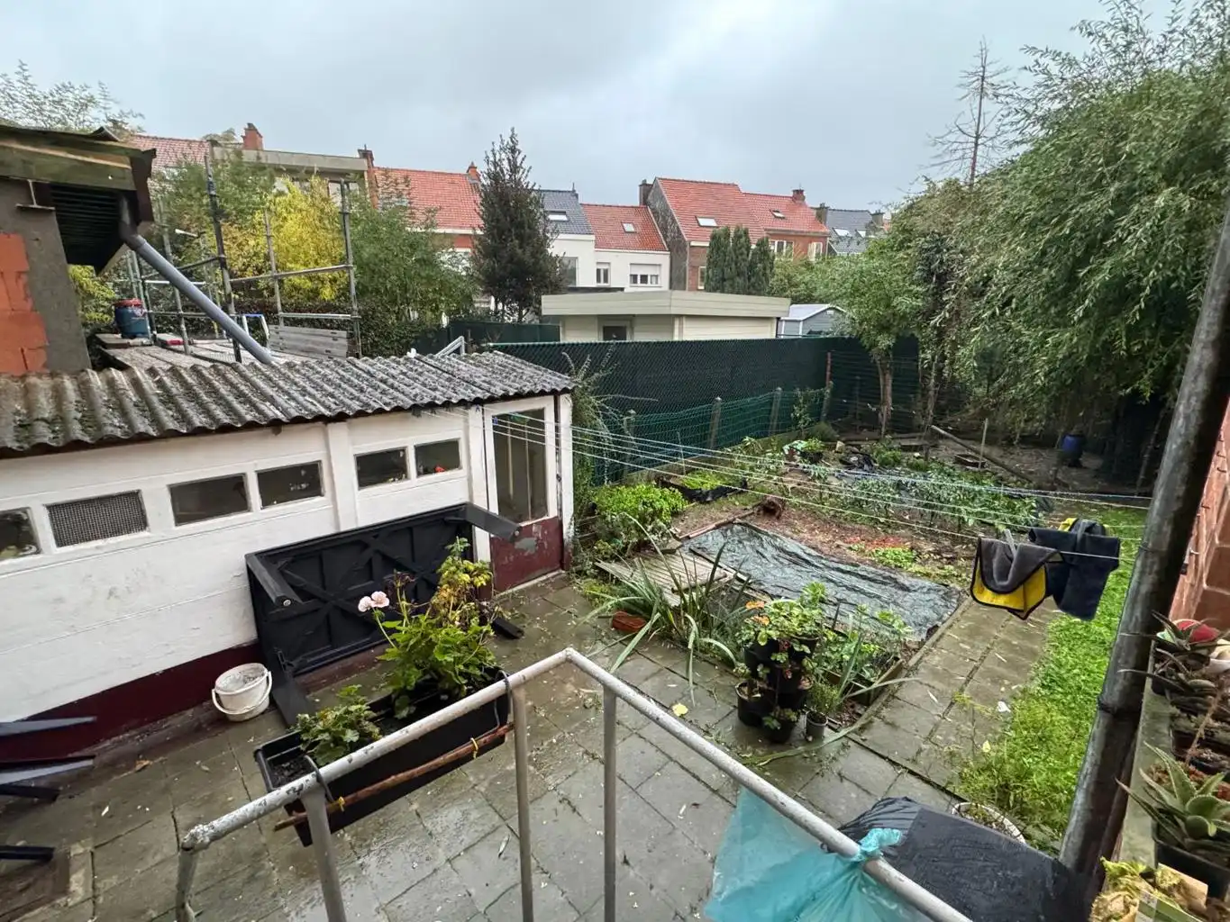 Opbrengsteigendom met 3 appartementen, tuin en 2 garages foto 8