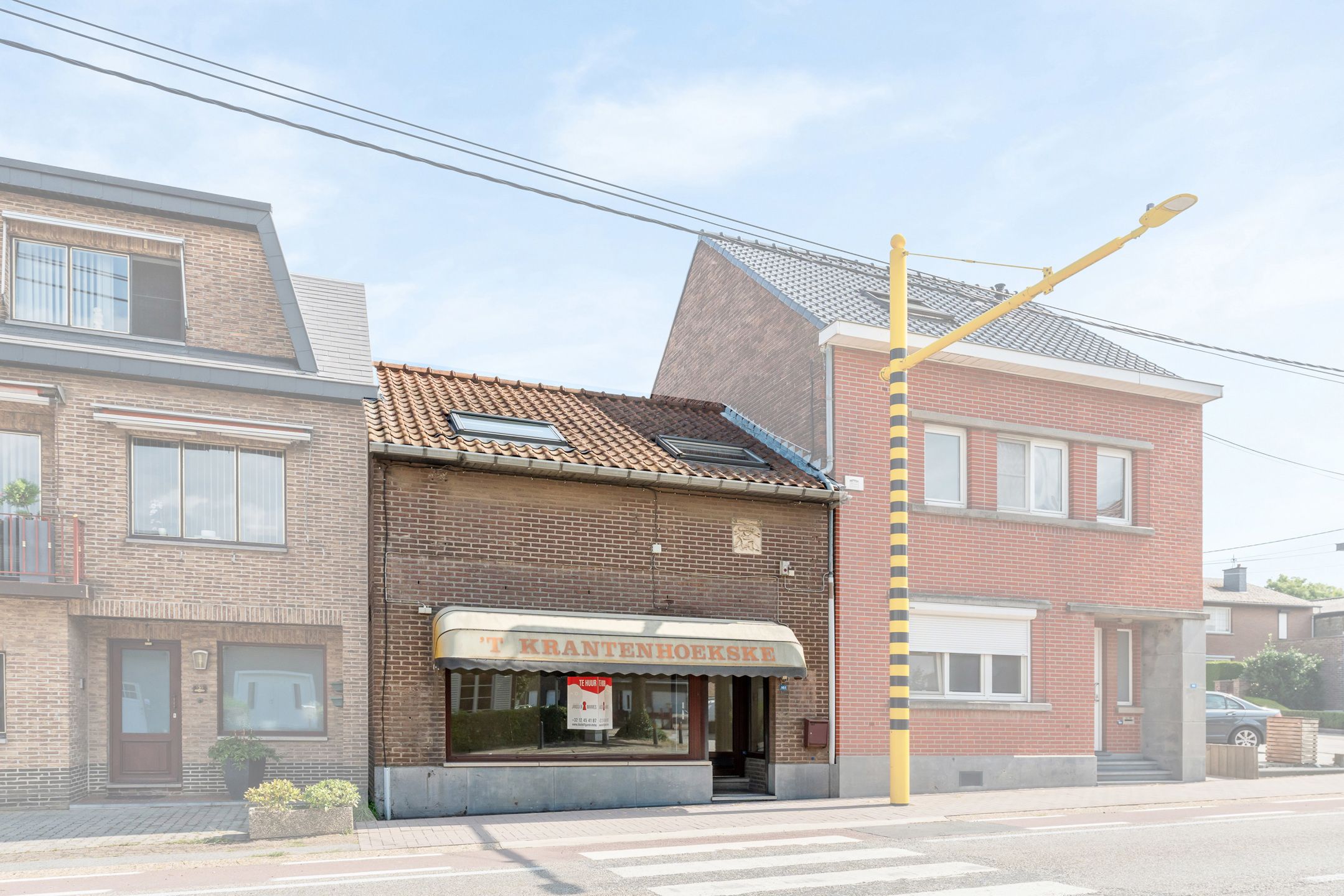 Woonst met handelspand  foto {{pictureIndex}}