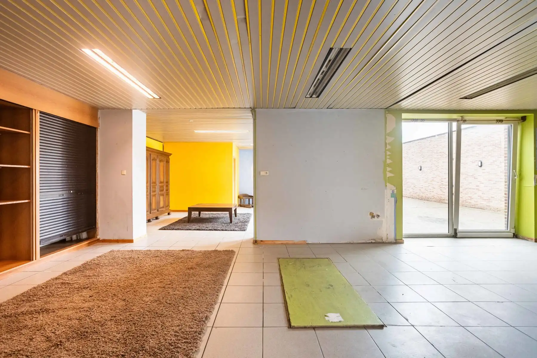 Polyvalente woning met tuin:  momenteel 2 appartementen garage en groot magazijn! foto 6