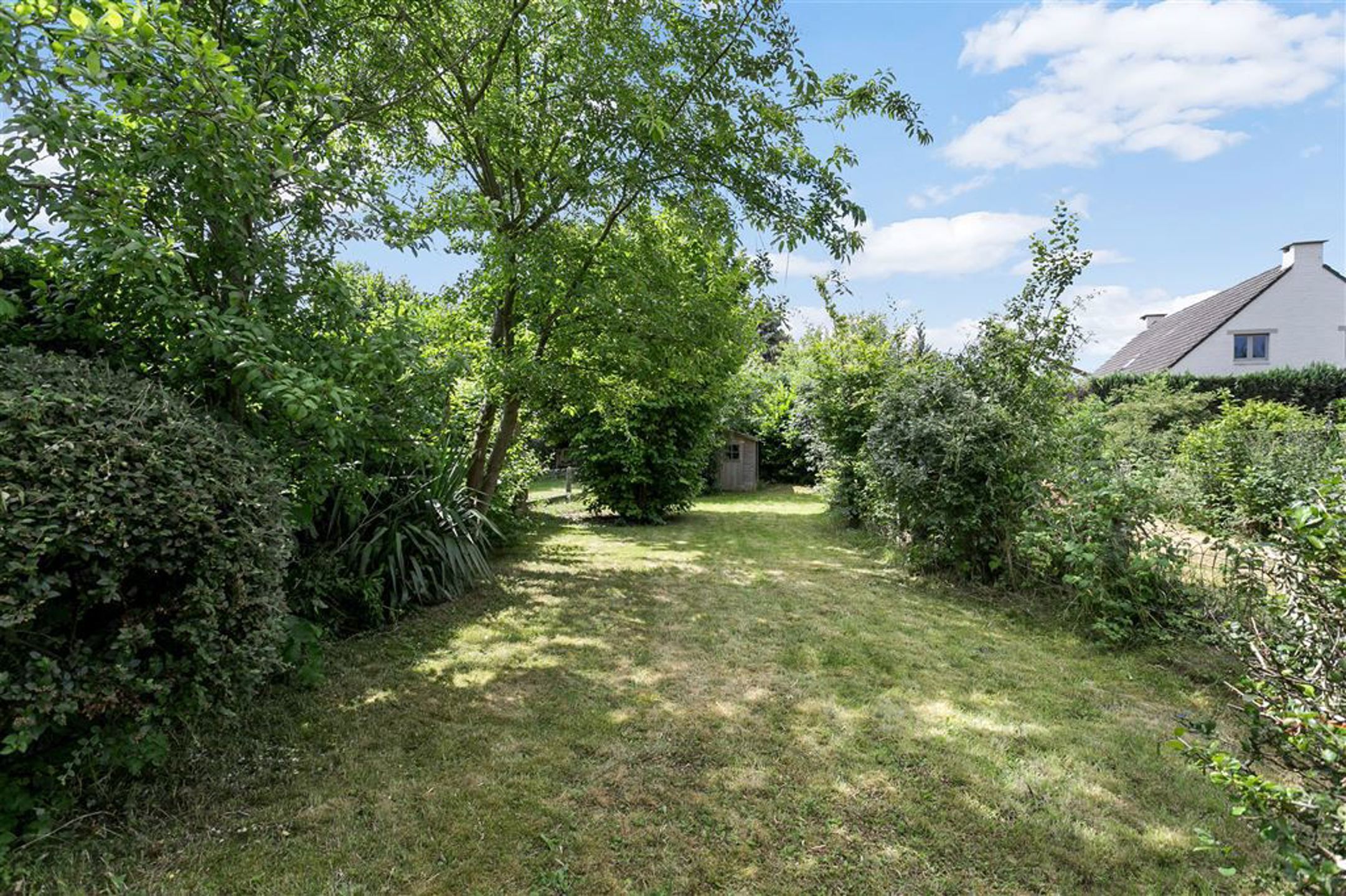 Aantrekkelijk huis met 3 slaapkamers en tuin  foto 21