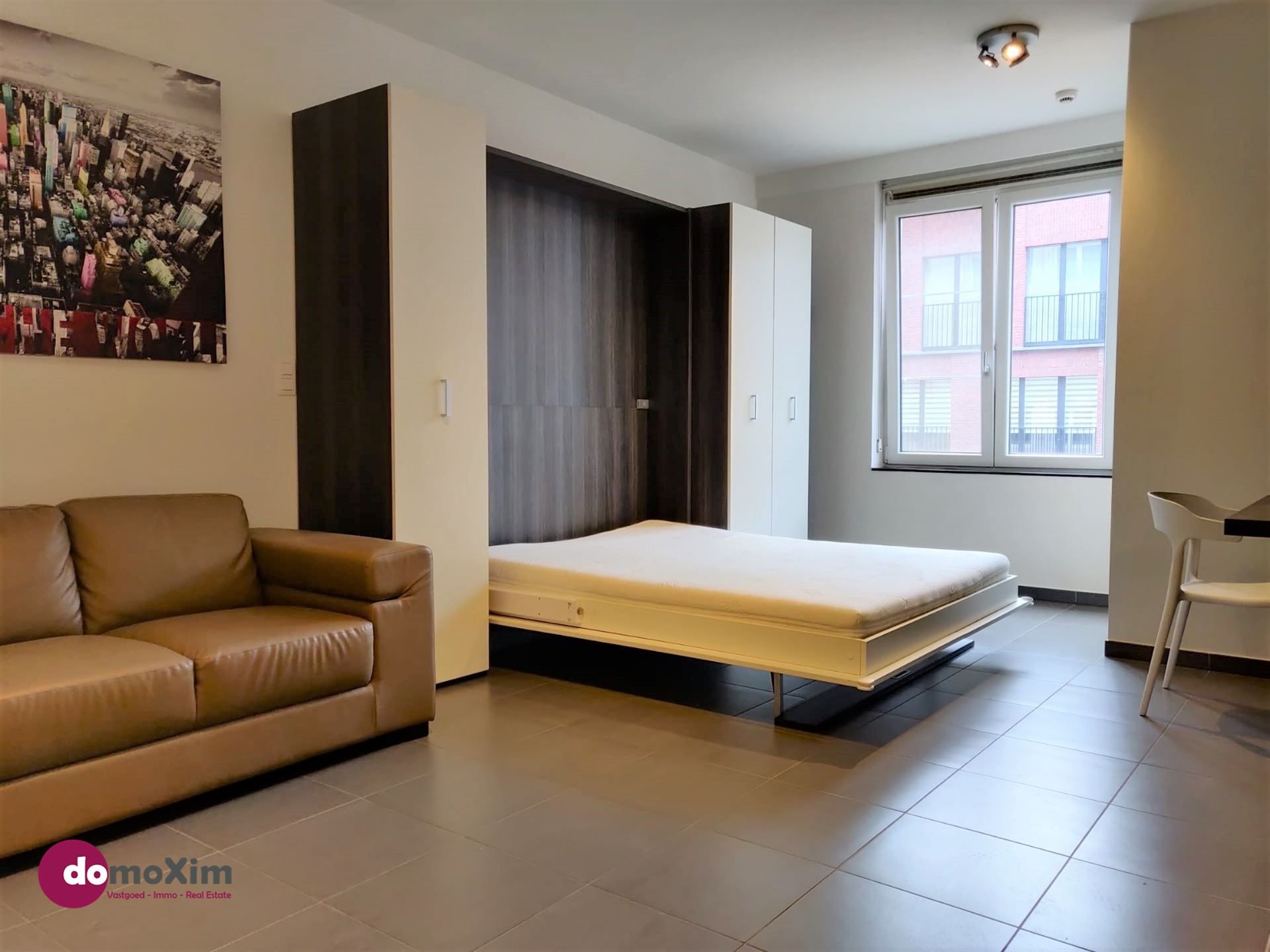 Moderne gemeubelde studio, geschikt voor twee personen, in het centrum van Leuven foto {{pictureIndex}}
