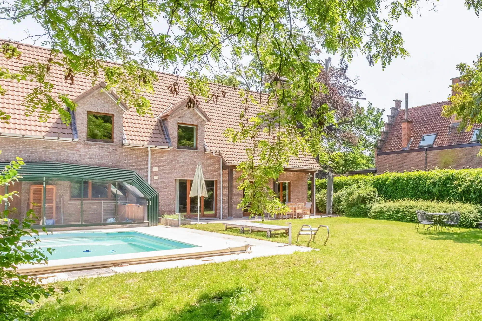 Welgelegen villa met praktijk en wonderlijke tuin foto 28