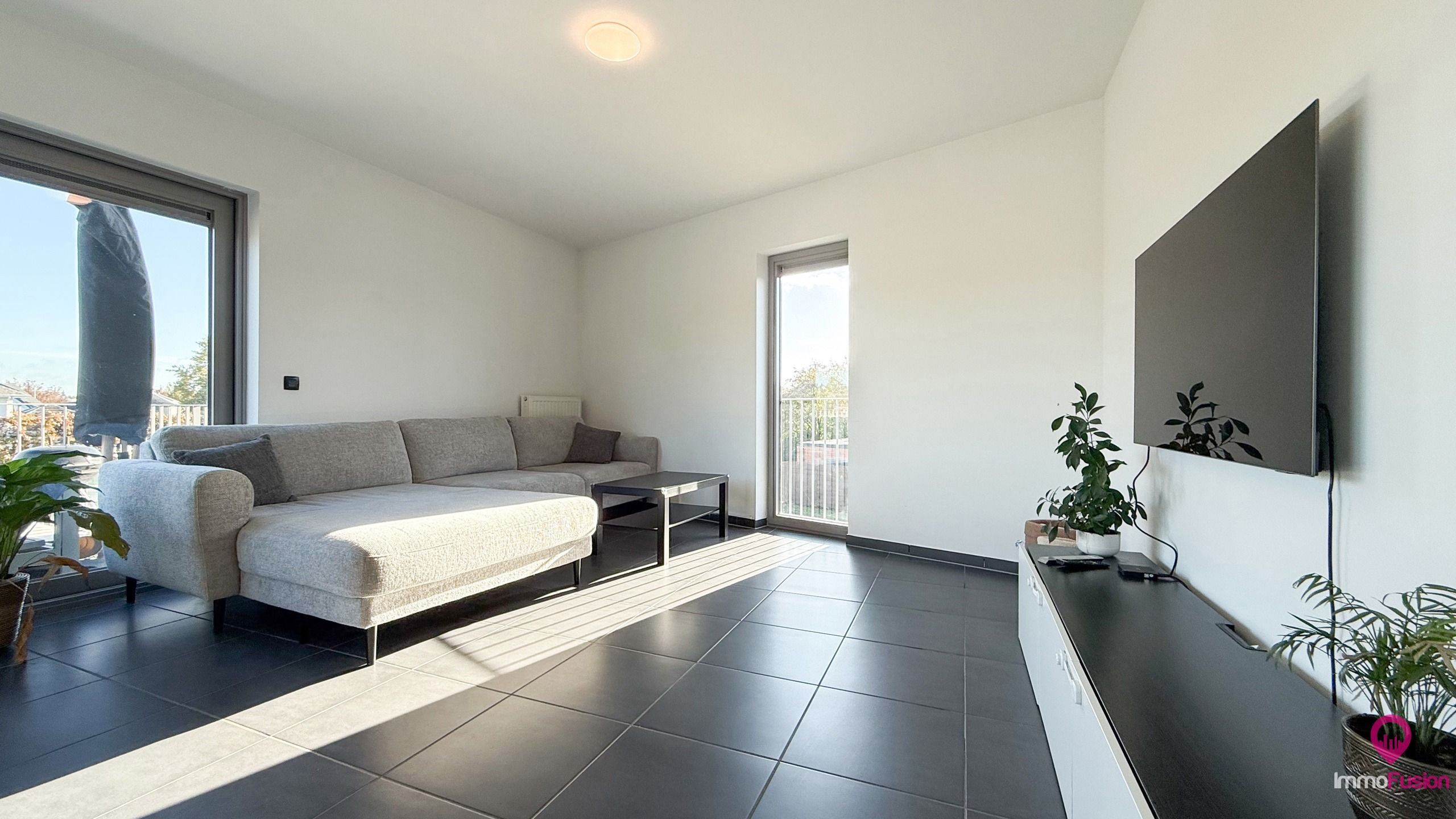 Instapklaar app met garagebox en 3slpk + ideale ligging! foto 3