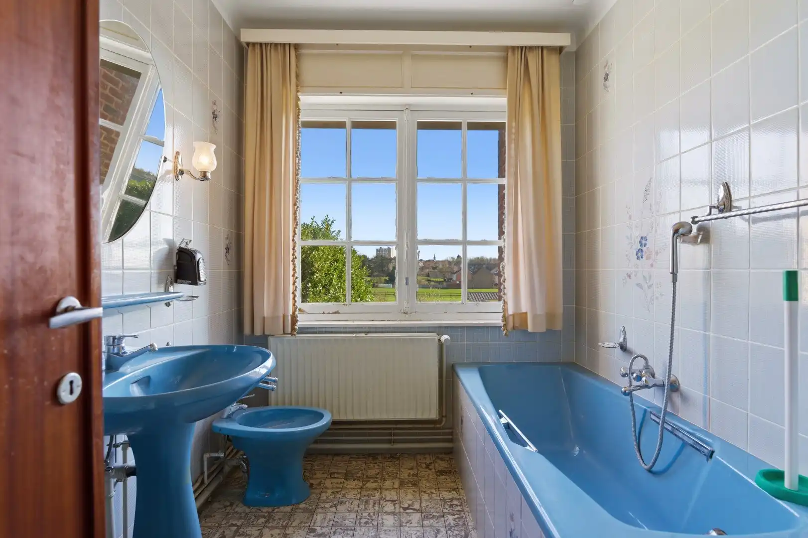 Op te frissen rijwoning met 2 slaapkamers en ruime tuin in Tienen foto 14