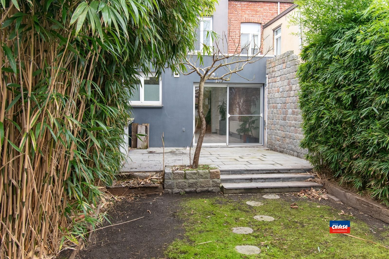 Rijwoning met drie slaapkamers en tuin foto 18