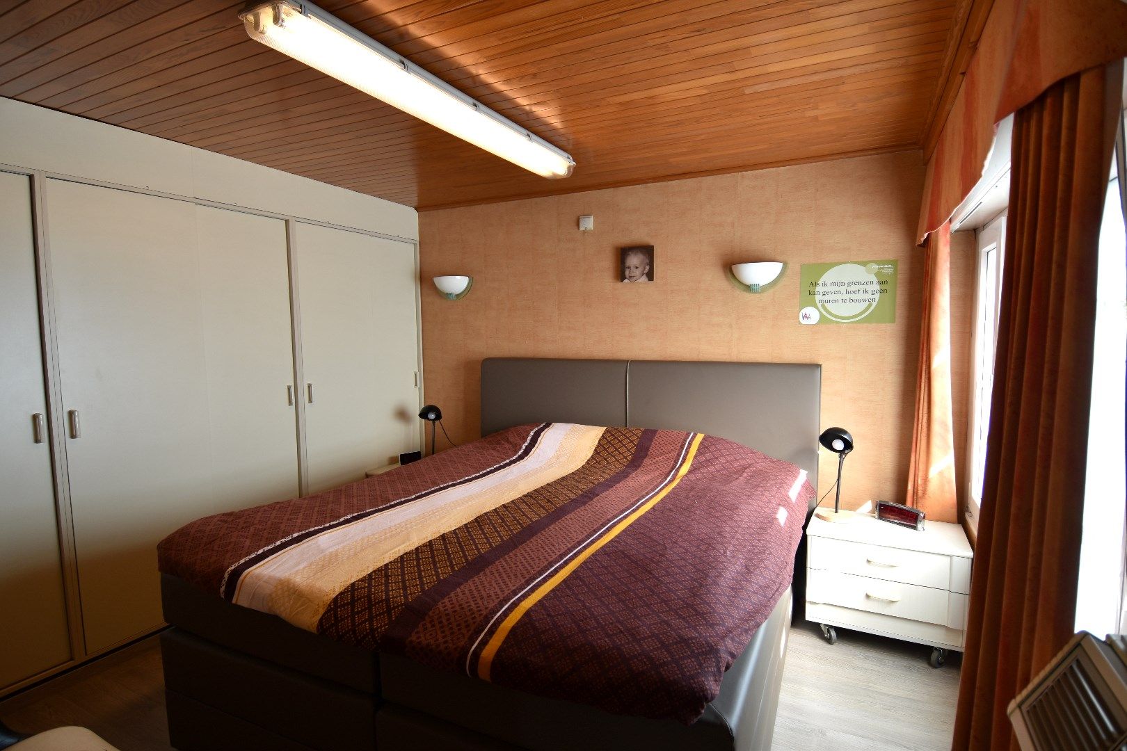 Mooie rijwoning met 2 slaapkamers, tuin en garage te koop in het gezellige Gullegem foto 11