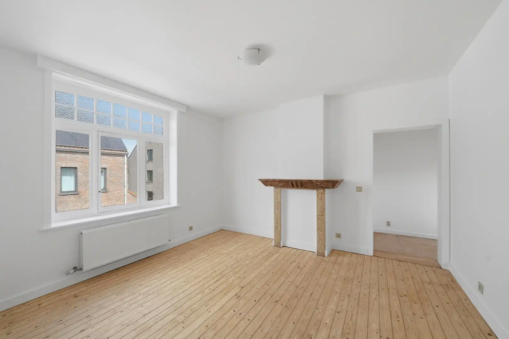Karaktervolle instapklare hoekwoning met inpandige garage en zonnige stadstuin foto 16