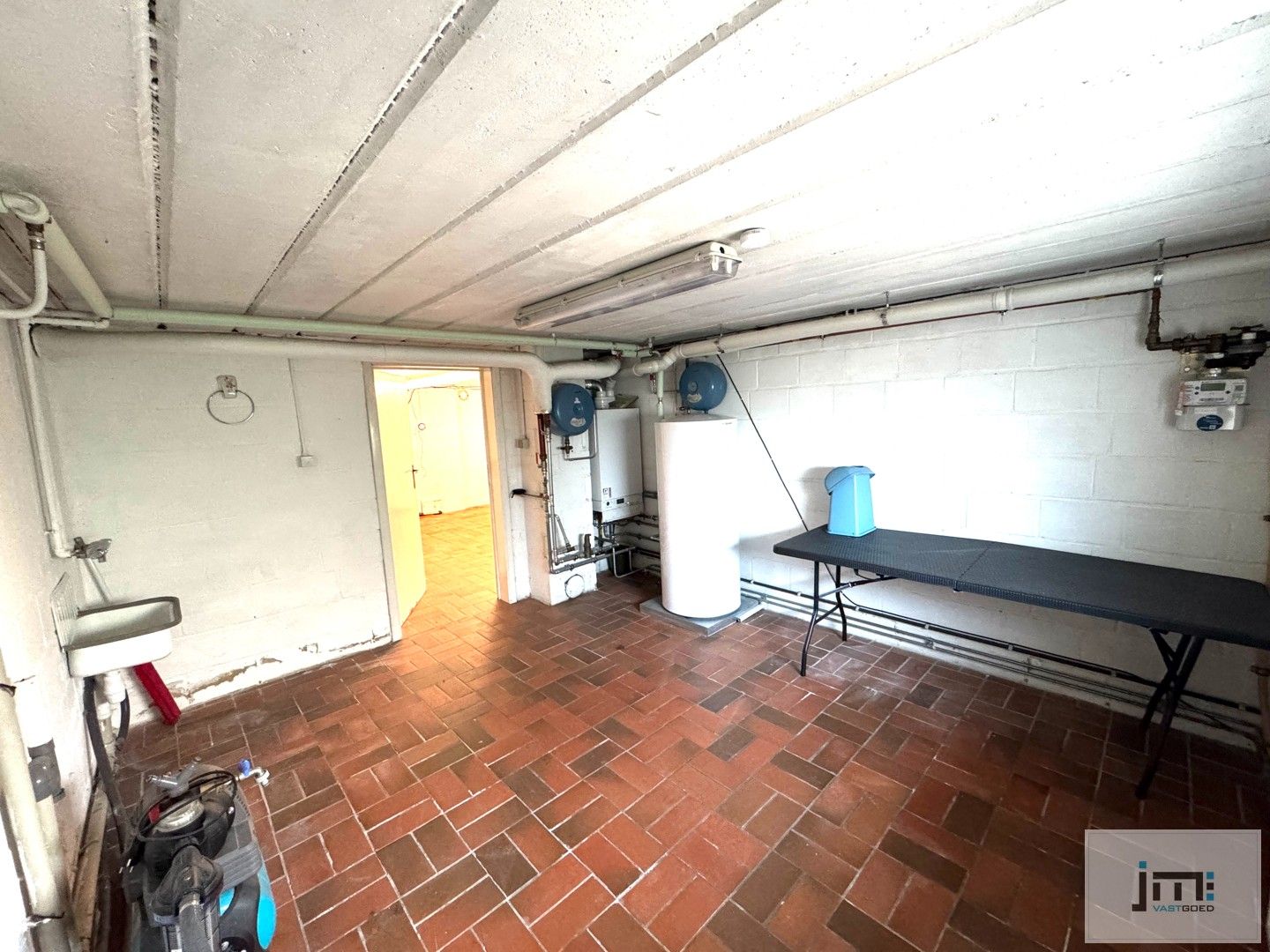 Ruime open bebouwing met tuin en garage foto 14