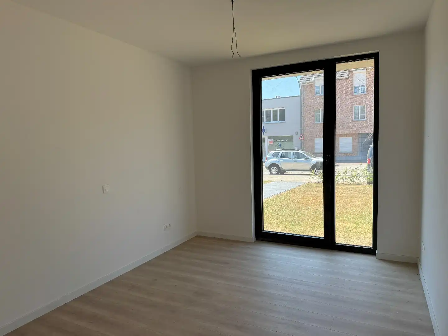 Laatste gelijkvloers 2-slpk appartement met tuin, 1 stpls en een kelder foto 10