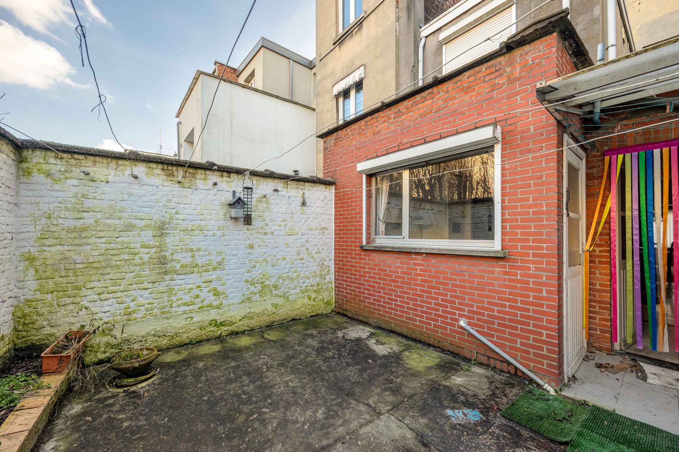 Zeer ruime te renoveren woning met 4 slpk en koer foto 24